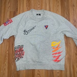 Nike Gray Crewneck Sweatshirt with Multicolor Graphic Accents